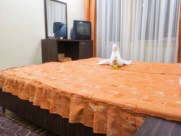 Фото номера Стандартный двухместный номер с 2 отдельными кроватями Отель Hotel Emi г. Mihail Kogălniceanu 10