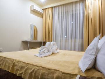 Фото номера Стандартный двухместный номер с 2 отдельными кроватями Отель Hotel Emi г. Mihail Kogălniceanu 4